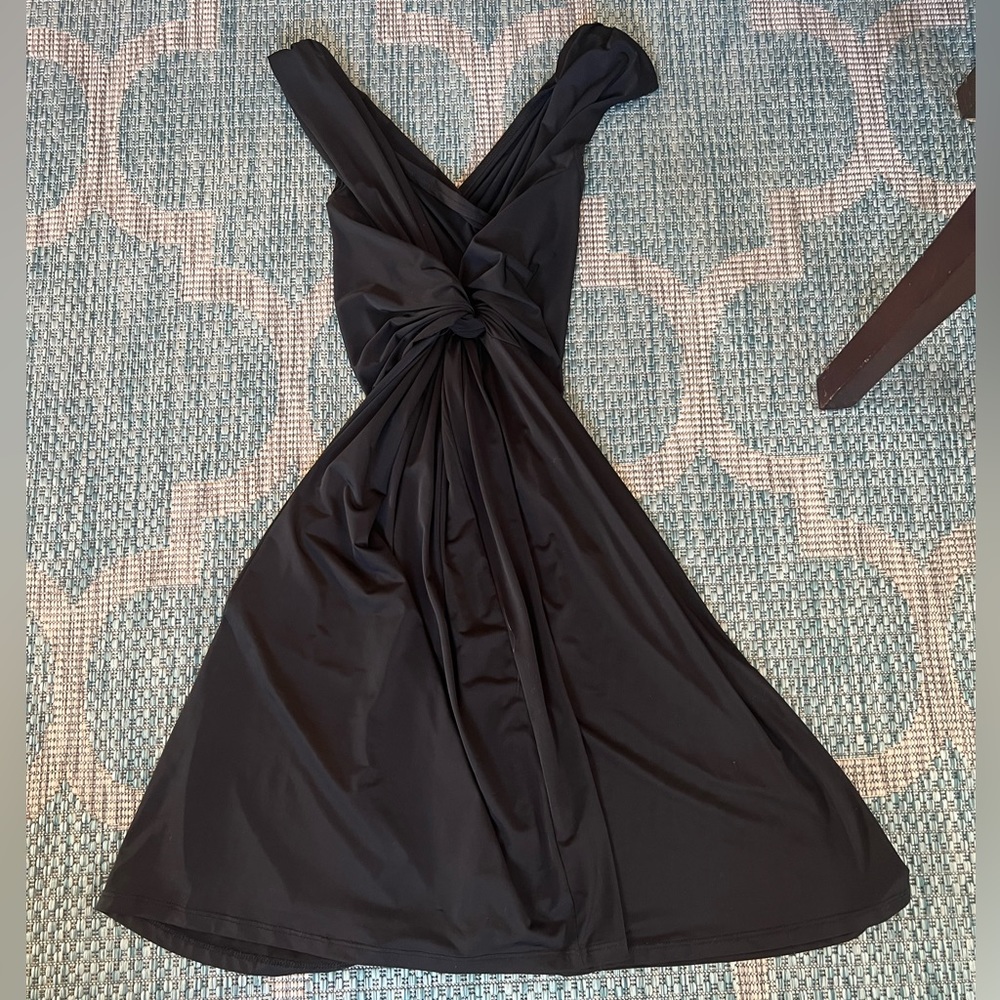 Venus black dress. V neck with cross cross backing. Size medium. Smoke free home